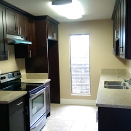 Espresso shaker cabinets with quartz counter top. Espresso shaker cabinets with quartz counter top.
