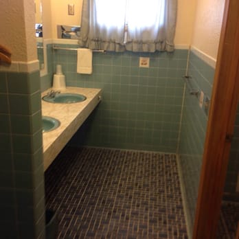 Nevada Inn - Big bathroom double sinks! - Hotels Near Me - Nevada, Missouri