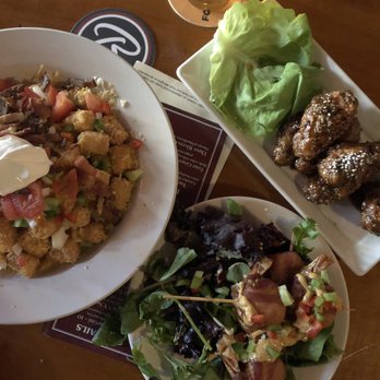 Jules Maes Saloon - Flatliner tots, bacon wrapped prawns, and spicy dragon wings - Comfort Food Near Me - Seattle, Washington