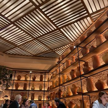 L'Olivé - Restaurant lower back seating areas with high ceiling. - Spanish Near Me - Barcelona, B L'Olivé - Restaurant lower back seating areas with high ceiling. - Spanish Near Me - Barcelona, B