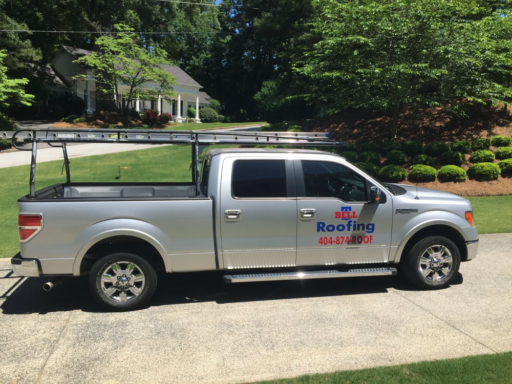 Slide of Bell Roofing
