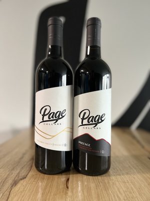 Photo of Page Cellars - Woodinville, WA, US. two bottles of wine on a table