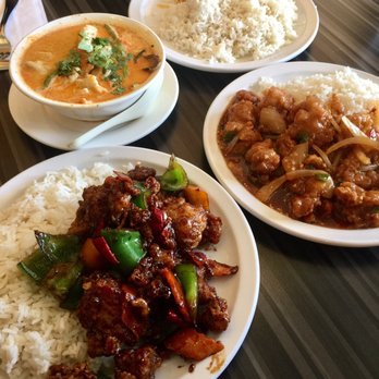 Hakka Legend Asian Cuisine - UP: both rice and curry (red chicken curry coconut based?) came together. Bottom left is Bombay chicken & bottom right is chili chicken. - Halal Near Me - Toronto, Ontario Hakka Legend Asian Cuisine - UP: both rice and curry (red chicken curry coconut based?) came together. Bottom left is Bombay chicken & bottom right is chili chicken. - Halal Near Me - Toronto, Ontario