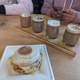 a breakfast sandwich on a plate a breakfast sandwich on a plate