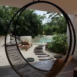 LIK Tulum - Patio with hanging chair