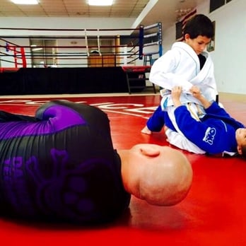 Key West PAL BJJ - Rich Thomas helping students - Sports Clubs Near Me - Key West, Florida Key West PAL BJJ - Rich Thomas helping students - Sports Clubs Near Me - Key West, Florida
