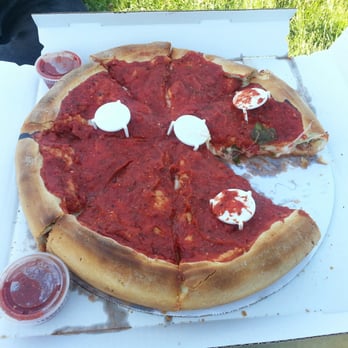 Francesca Pizza - Large Stuffed Pizza with sausage, onions, peppers and spinach. Husband grabbed a slice while it was still HOT. - Italian Near Me - Sheridan, Illinois Francesca Pizza - Large Stuffed Pizza with sausage, onions, peppers and spinach. Husband grabbed a slice while it was still HOT. - Italian Near Me - Sheridan, Illinois