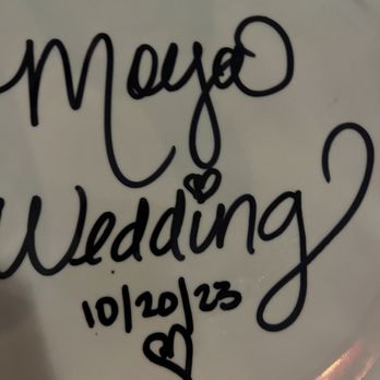La Cabrera - They gave the wedding couple a plate to draw on so that it could be displayed in the restaurant. - Steakhouses Near Me - Buenos Aires, C