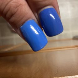 Pretty Nails - Left nail is the atrocious job that was done today.