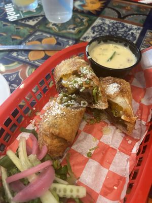 EAT Eggrolls and Tacos by null