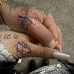 No Mercy Tattoos - J & K off a website