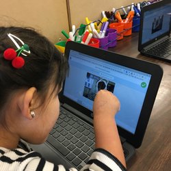 Madison Elementary School - Kindergarten using touch screen Chromebook