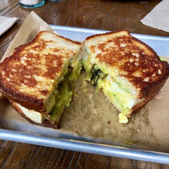 Grass Roots Kitchen - Vegan egg sandwich (tofu, a magical runny yolk, avocado, and shiitake bacon) on GF bread... swoon - New American Near Me - Tarrytown, New York Grass Roots Kitchen - Vegan egg sandwich (tofu, a magical runny yolk, avocado, and shiitake bacon) on GF bread... swoon - New American Near Me - Tarrytown, New York