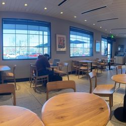 Starbucks - Panoramic view of the inside looking out towards the parking lot.