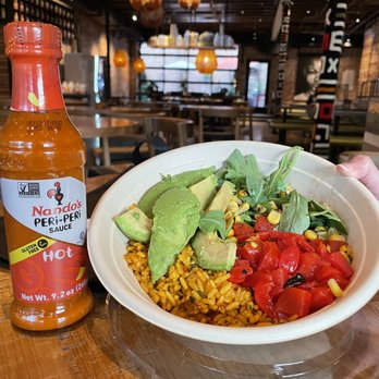 Nando's Peri-Peri - Avocado and roasted red peppers bowl - South African Near Me - Chicago, Illinois Nando's Peri-Peri - Avocado and roasted red peppers bowl - South African Near Me - Chicago, Illinois