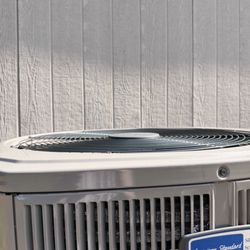 Hendrick Heat and Air - Outside unit of our new heat pump HVAC unit