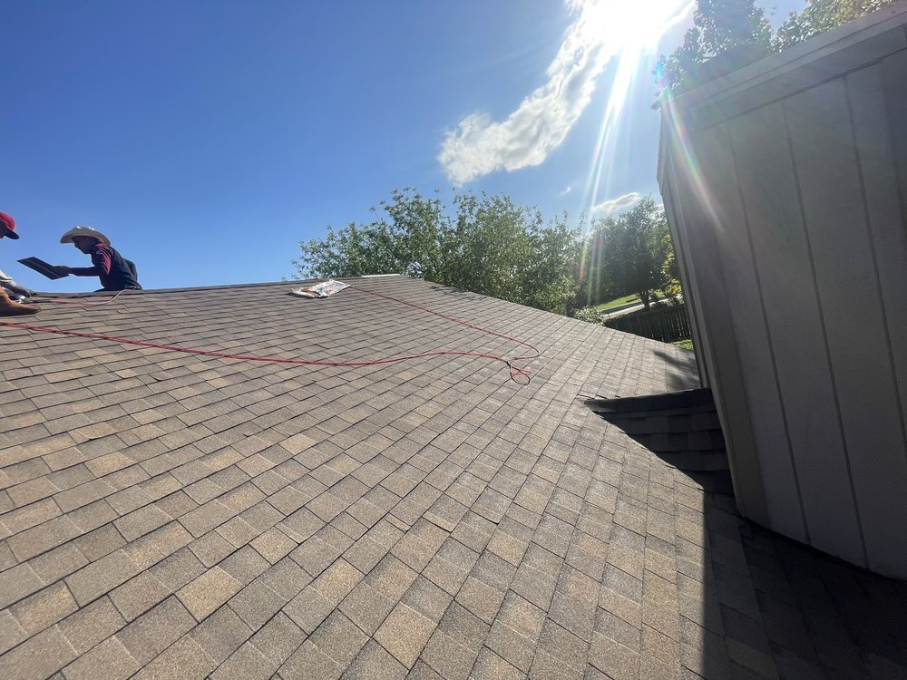 Slide of Design Roofing & General Contractors