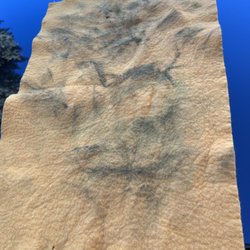 Atomic wash - Dirt on my towel after a $14 "Deluxe" wash.
