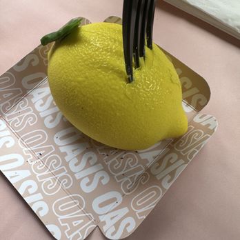 The Oasis Cafe - Lemon pastry with surprise center - Desserts Near Me - Queens, New York The Oasis Cafe - Lemon pastry with surprise center - Desserts Near Me - Queens, New York