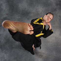 Northampton Martial Arts - Mr. Scher Kicking high for the camera