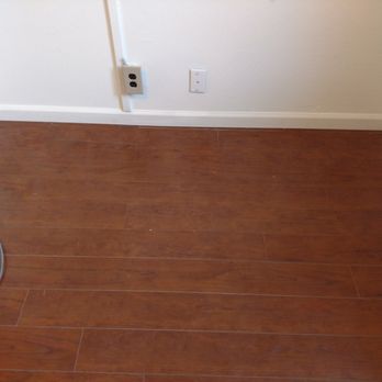 Advantage Home Improvement - Already installed floor continued from office into the closet. - Windows Installation Near Me