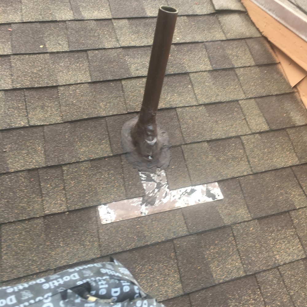 Becker Enterprises - Reused dented and rusted metal flashing salvaged from original. roof instead of using new flashing. - General Contractors Near Me - Northridge, California