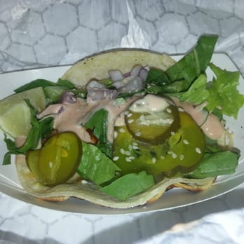 Lloyd Taco Trucks - BIG lloyd: Plato dale farms ground beef, cheddar-jack cheese, 1,000 island dressing, pickles, onion, sesame seeds, & lettuce - Food Trucks Near Me