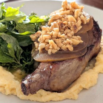 Stokes Adobe - Bone in pork chop, ok. Did not like the apple pairing with it - New American Near Me - Monterey, California