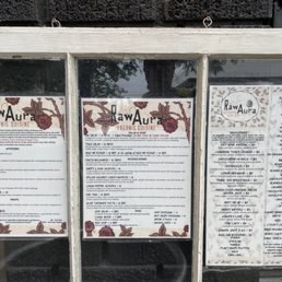 menus in a window of a restaurant