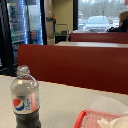 Baldie's Pizzeria - Seating area and drink cooler