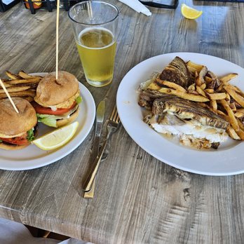 Hog Island Fish Camp - Outdoor seating enjoying hog fish sliders and grouper reuben sandwich, all was delicious. - Seafood Near Me - Dunedin, Florida