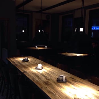 Giannis Imbiss - The inside. Small dark but the candles are nice - Greek Near Me - Pulheim, NW