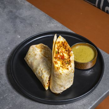 Palenque Kitchen - Breakfast Burrito
Choice of chorizo or chicken scrambled egg, crispy potatoes, shredded cheese, pico de gallo - Mexican Near Me - Riverside, California Palenque Kitchen - Breakfast Burrito
Choice of chorizo or chicken scrambled egg, crispy potatoes, shredded cheese, pico de gallo - Mexican Near Me - Riverside, California