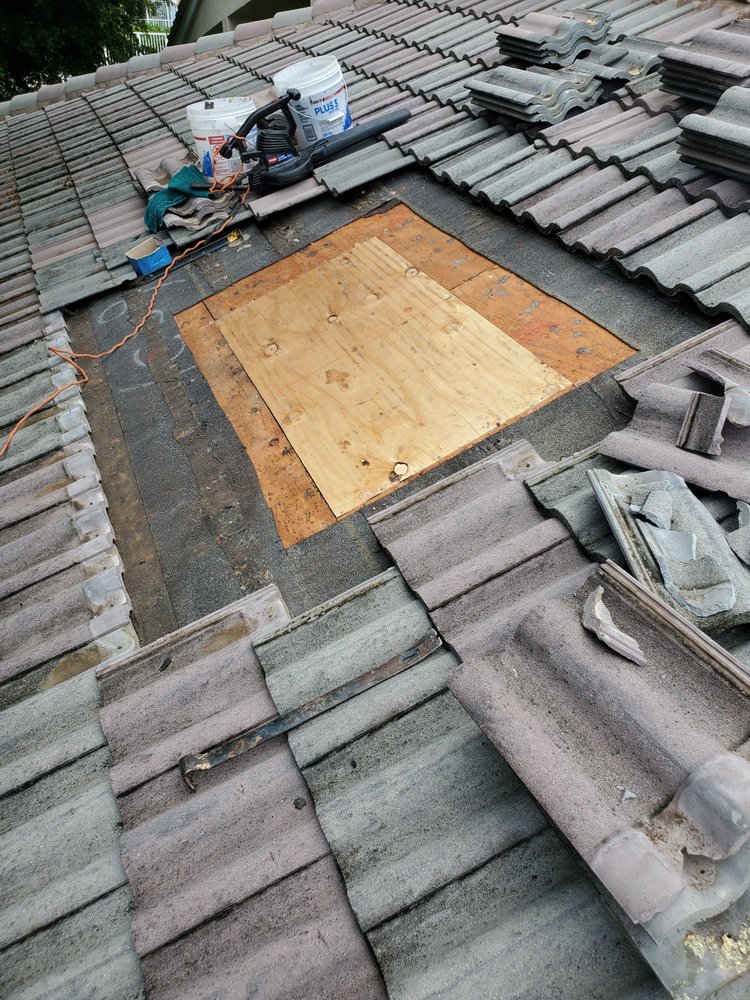 Slide of Rip Tide Roofing