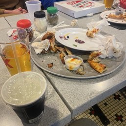Pig out sesssion  of pizza and chicken wings.