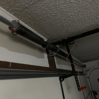 214 Garage Door - Before - broken spring - Garage Door Services Near Me - Richardson, Texas