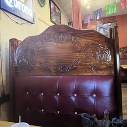 Soft hand carved seats with maroon leather padding