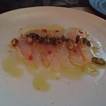 Perry St - New Zealand Snapper Sashimi with Lemon, Olive Oil, Crispy Skin - New American Near Me - New York, New York Perry St - New Zealand Snapper Sashimi with Lemon, Olive Oil, Crispy Skin - New American Near Me - New York, New York