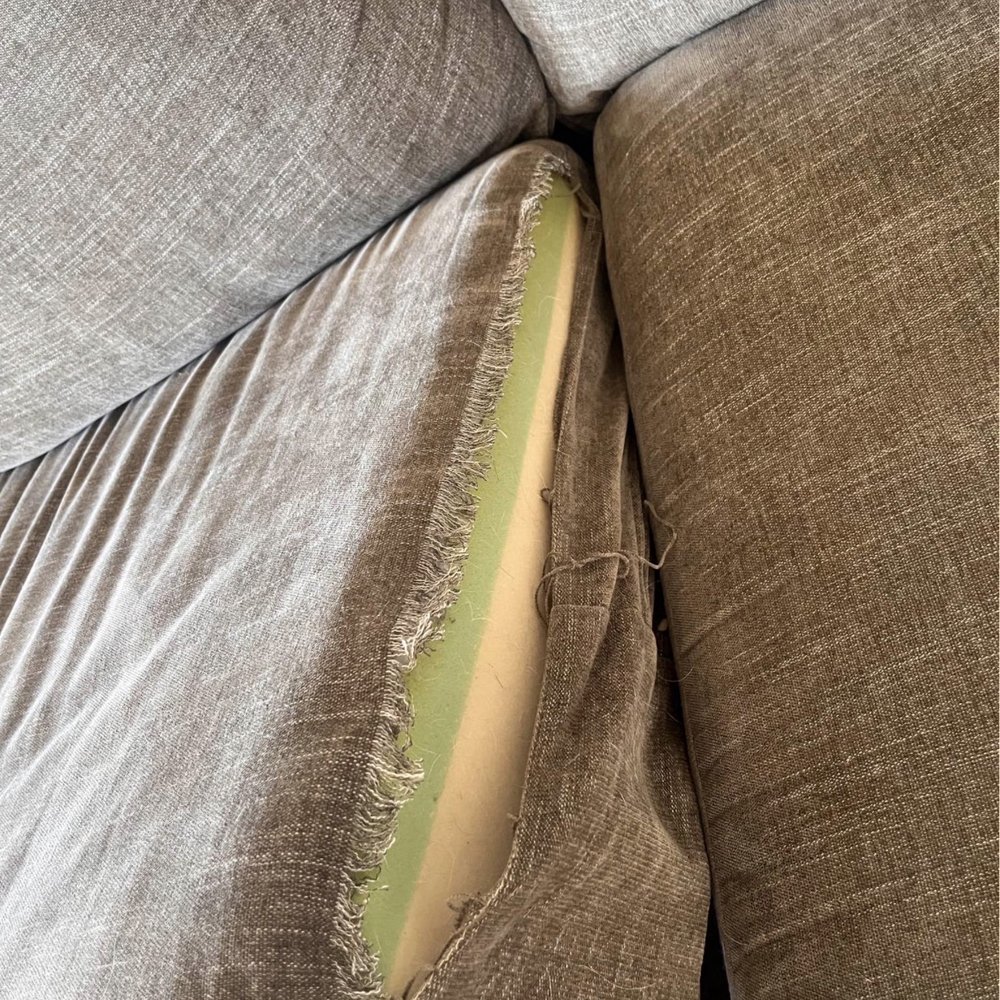 Gaby's Feather And Down - before photo of the huge rip that came with the couch seat pillow (bought second-hand). - Furniture Reupholstery Near Me - Los Angeles, California