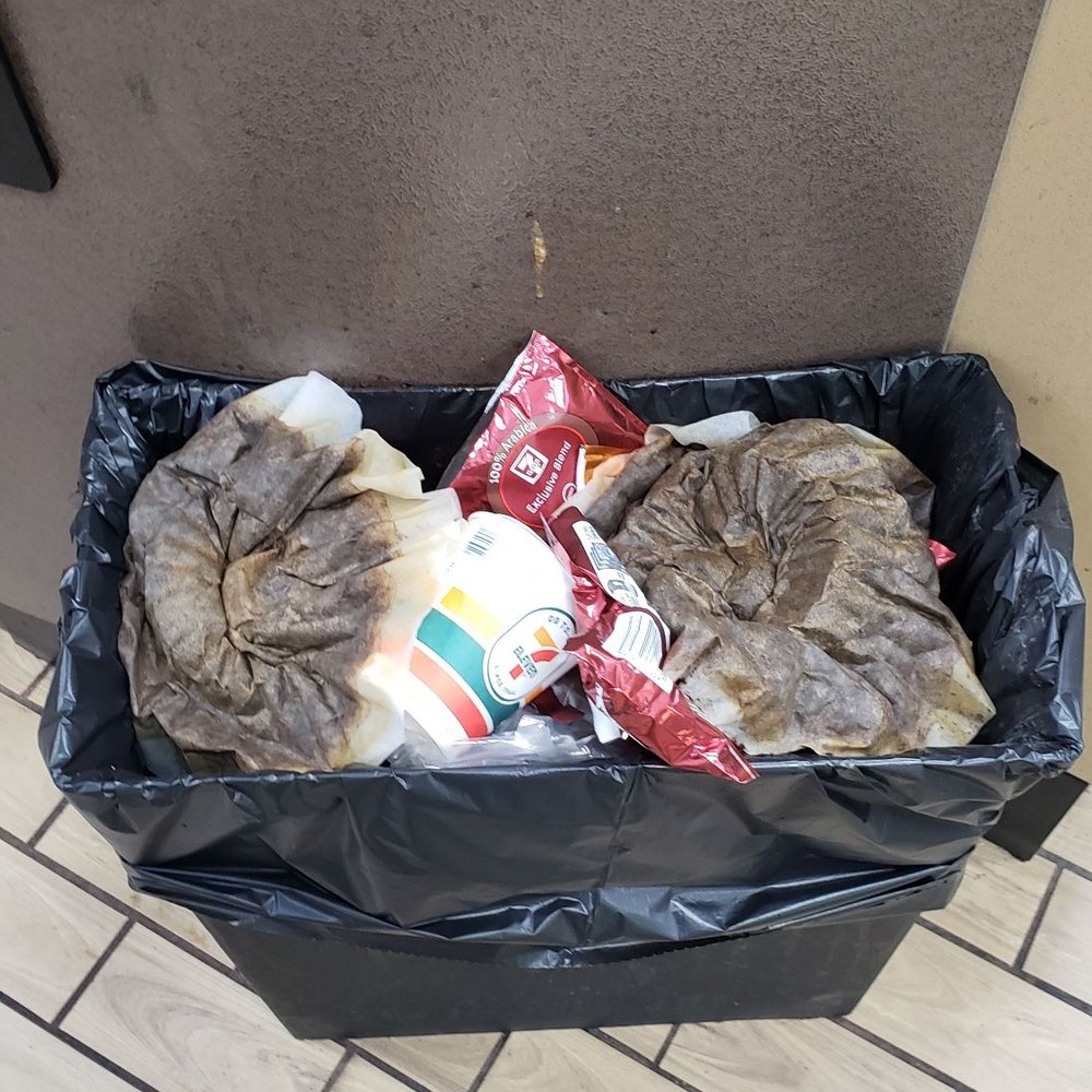 7-Eleven - two cats sleeping in a trash can - Convenience Stores Near Me - Hempstead, New York