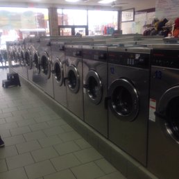 Inside the laundromat. Inside the laundromat.