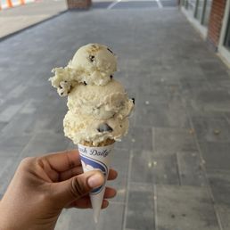 Chocolate chip cookie dough ice cream on sugar cone Chocolate chip cookie dough ice cream on sugar cone