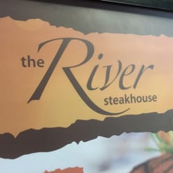 The River Steakhouse - Sign at Entrance