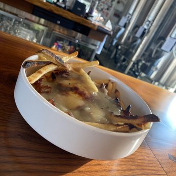 Ghost Isle Brewery - The train wreck/shipwreck Their version of poutine fries - Brewpubs Near Me - New Buffalo, Michigan