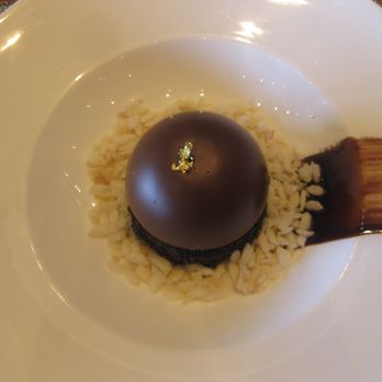 Riverpark - Dessert ($5 suppl): Cereal and Milk (custard cream inside the dark chocolate ball). Cream was a bit too sweet, but the chocolate was yummy. - New American Near Me - New York, New York