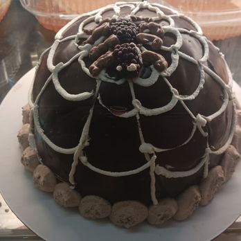 Dolci Paradise - a chocolate cake on a plate - Bakeries Near Me - Woodside, New York Dolci Paradise - a chocolate cake on a plate - Bakeries Near Me - Woodside, New York