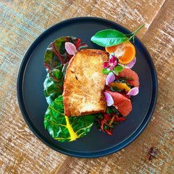 Copper at Dorset - Seared Salmon on sautéed collard greens with fruit