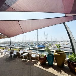 View of the San Diego Bay under some shade sails. View of the San Diego Bay under some shade sails.
