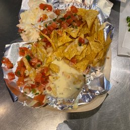 Not sure what kind of nachos this is watered down cheese nasty chips. Got me this time not again Not sure what kind of nachos this is watered down cheese nasty chips. Got me this time not again