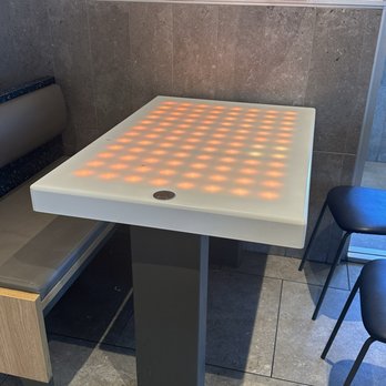 McDonald's - Interactive table. If you put your hand over it, the dots change colors. - Fast Food Near Me - Lebec, California